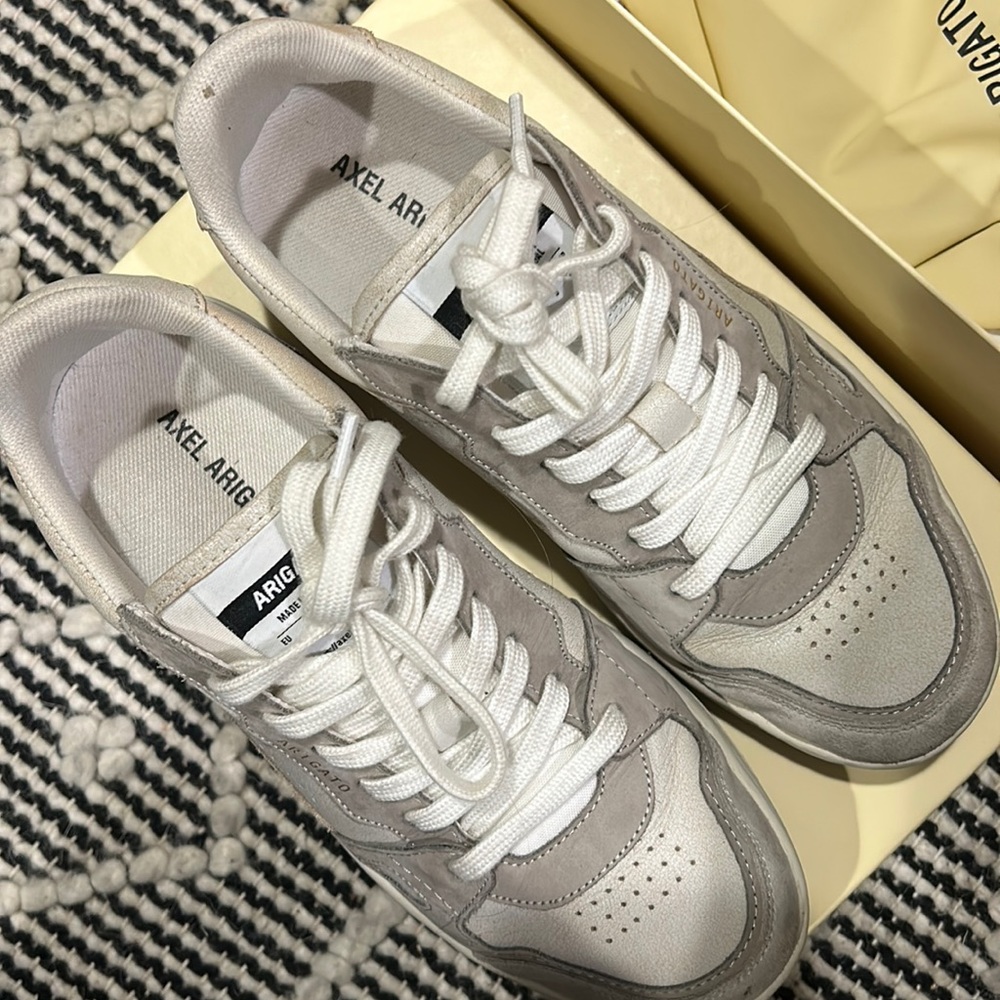 Gray and white Axel Arigato sneaker